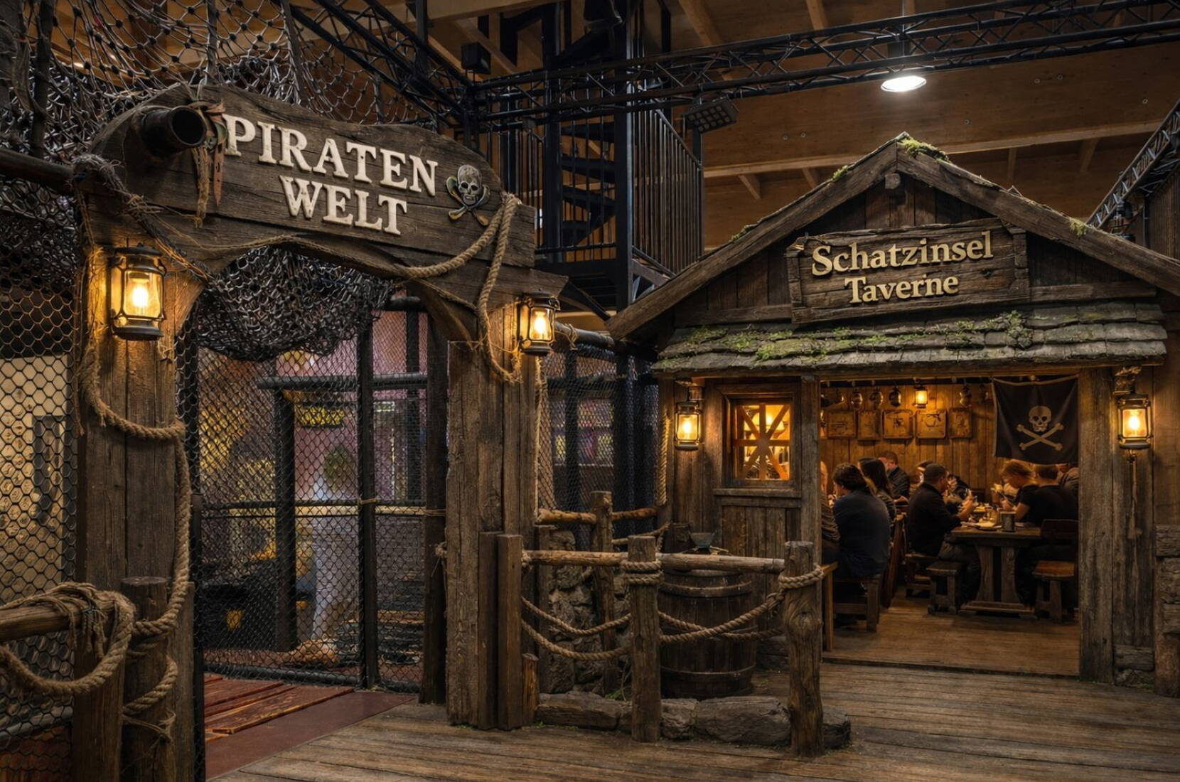 Der detailreich gestaltete Eingangsbereich der Piratenwelt führt direkt zur rustikalen Schatzinsel-Taverne. Holz, Seile, Laternen und liebevoll inszenierte Dekorationselemente schaffen eine immersive Abenteueratmosphäre.