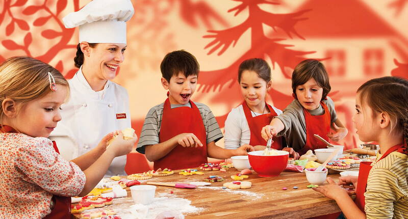 Excursion familiale Expérience Kambly. Découvrez le monde de la pâtisserie fine et explorez l'origine et l'univers d'expérience de Kambly Trubschachen dans l'Emmental.